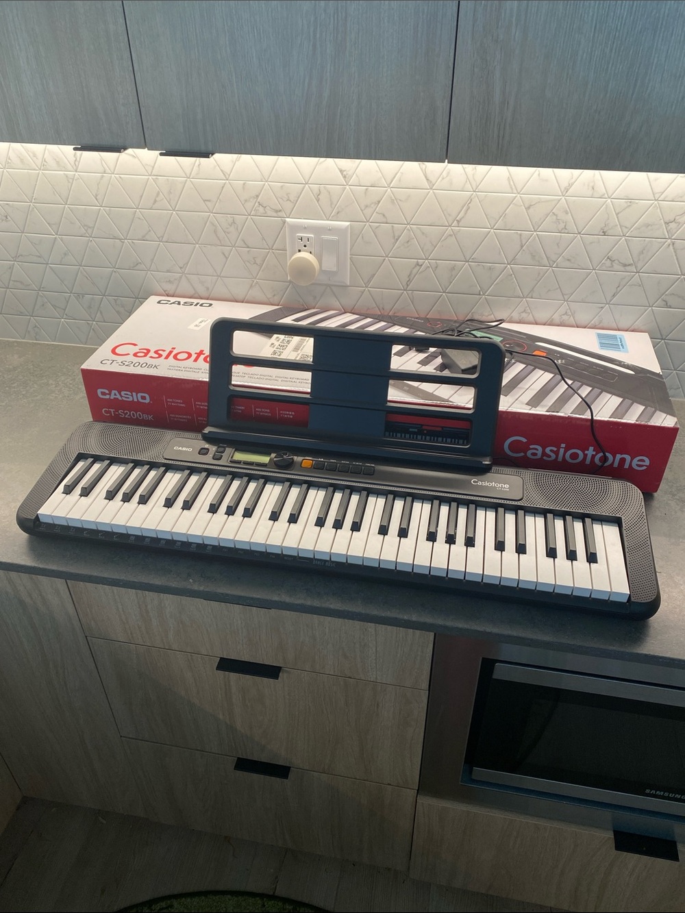 Casio Casiotone Portable Electronic Keyboard in Black and White